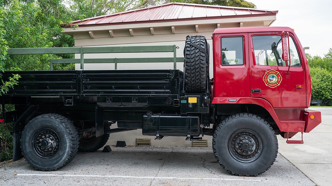 Longboat Key got its high-water vehicle from the Florida Forest Service. The town can keep it on loan for as long as it wants, but agreed to repaint the truck, which formerly had a camo livery.