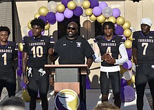 Carlos Woods (center) led Booker football to the FHSAA Class 3A state semifinals and a 12-2 record last season, but will not return for year two.