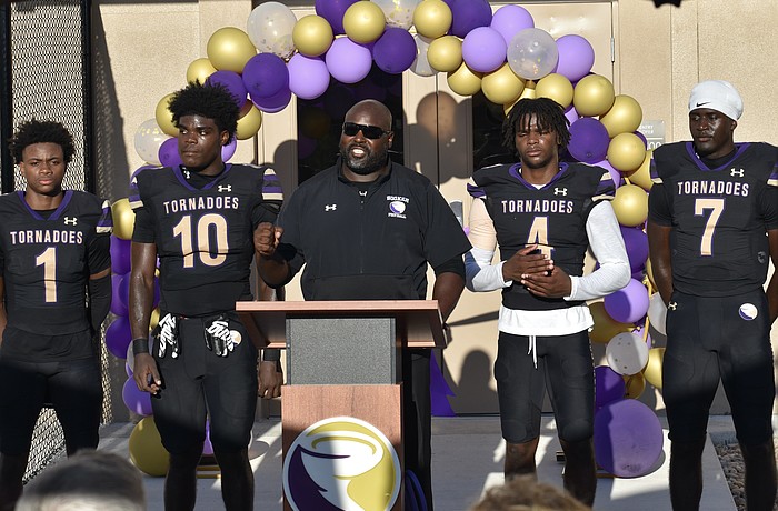 Carlos Woods (center) led Booker football to the FHSAA Class 3A state semifinals and a 12-2 record last season, but will not return for year two.