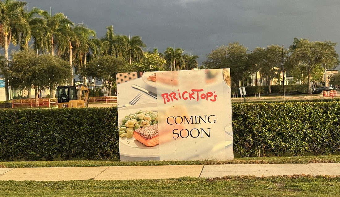 A sign along University Parkway at North Cattlemen Road announces the coming of BrickTop's, a Nashville-based New American restaurant.