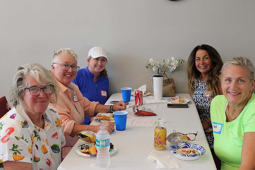 Lisa and Renee Fannin, Lindy Terry, Karen Vito and Nell Willis enjoy lunch catered by Lisa Fannin.