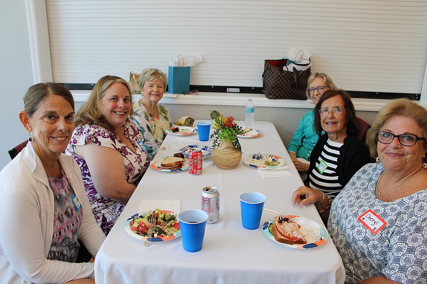 Lindsey Columbo, Angelina Boyce, Jamie Engel, Margret McCurry, Venette Motyl and Cheryl Calvo enjoy their lunch, catered by Lisa Fannin.