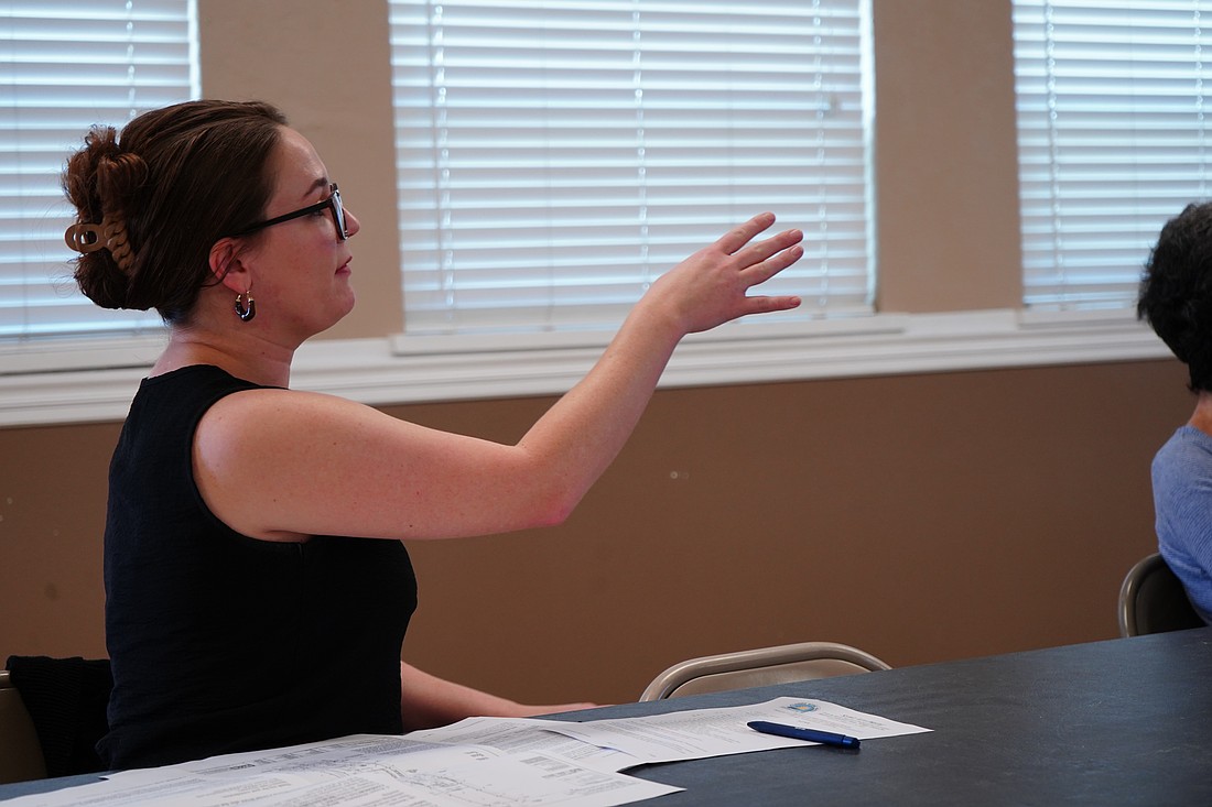 Casey Travers of Stephenson Wilcox & Associates interacts with the A1A Scenic Pride Committee at a recent meeting. Photo by Abe Mills