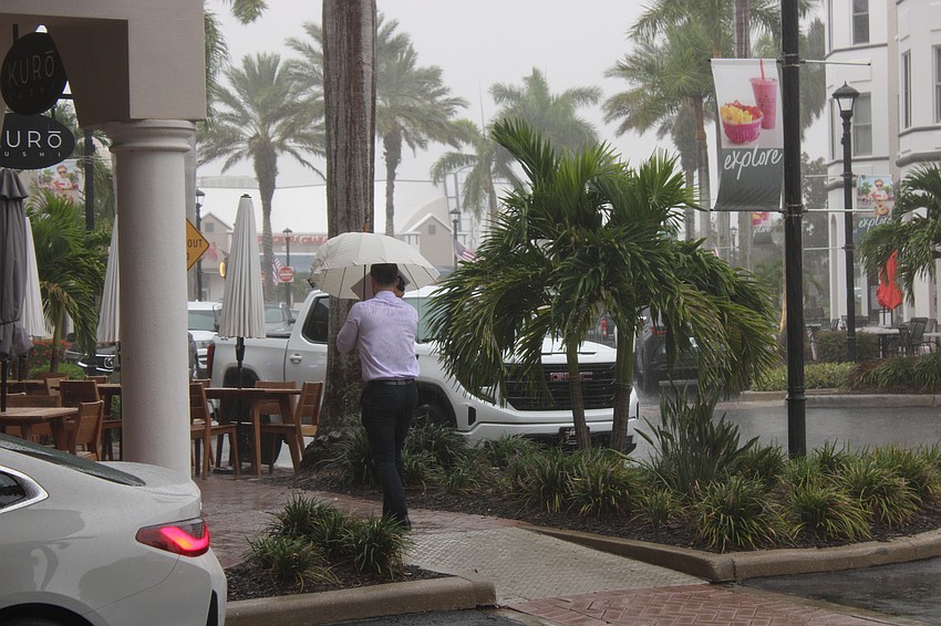 It took most of June and July, but the umbrellas are finally coming out.
