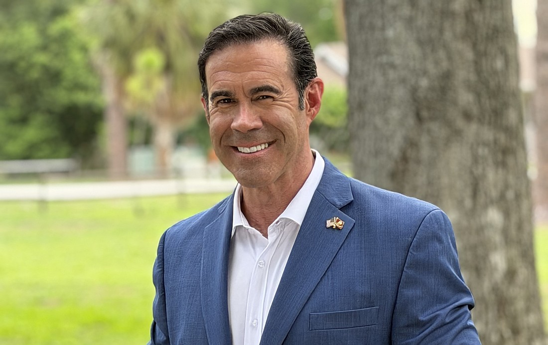 Tim Wilkins is the only candidate who lives in District 11.