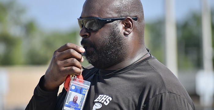 Carlos Woods, pictured here before the 2025 high school football season, was dismissed from Booker last week. He led the Tornadoes to the FHSAA Class 3A state semifinals in his year as coach.