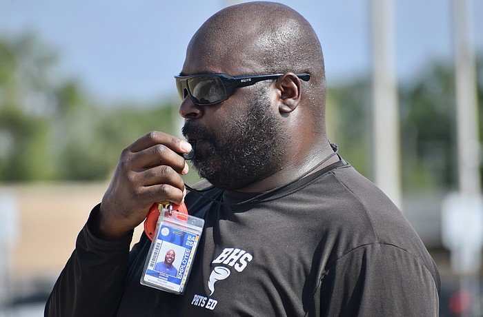 Carlos Woods, pictured here before the 2025 high school football season, was dismissed from Booker last week. He led the Tornadoes to the FHSAA Class 3A state semifinals in his year as coach.