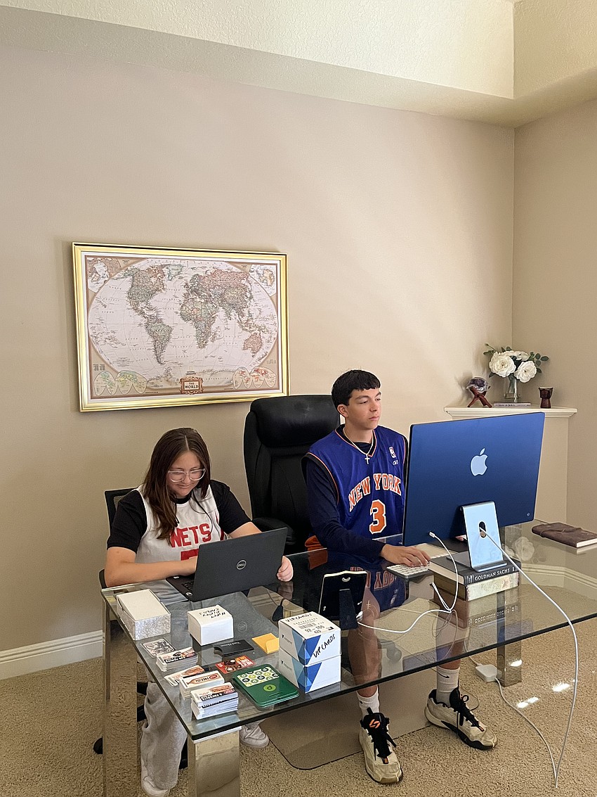 Emma LaRusso (left) is the live streamer and content creator for Cards2Tuff. Braydon LaRusso (right) handles sourcing by finding in-demand cards at the best deals available.