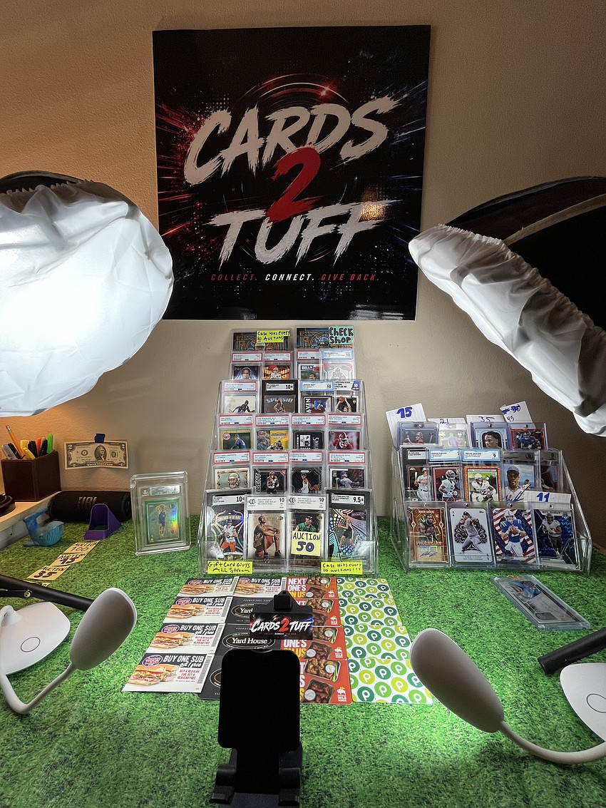 The LaRusso's studio setup is pictured. In live auctions on Whatnot, streamer Emma LaRusso shows prospective buyers the condition of each card and discusses each card's significance.