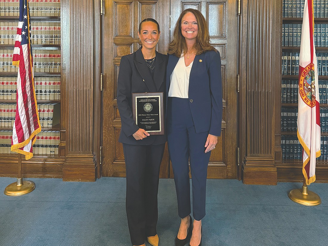 Daley Pajcic, left and State Attorney for the 4th Judicial Circuit Melissa Nelson. Pajcic, an assistant state attorney, received the Mission Vision Values Award.
