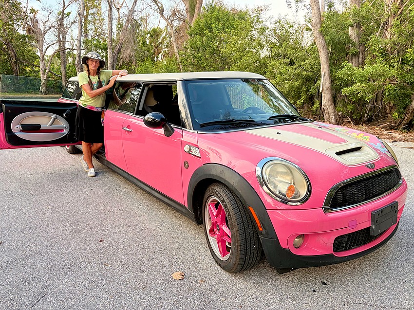 From the pink rims to the pink trim on the leather seats, every inch of Christy James's Coupe limo is on theme.