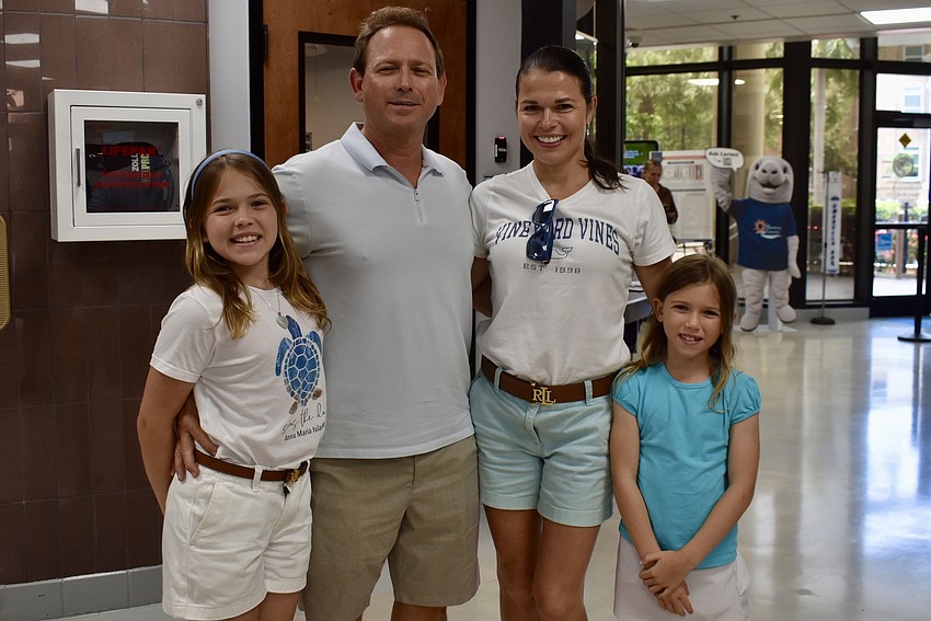 Matt Smith, owner of the Ellenton Ice and Sports Complex, (pictured with his wife, Natalia Smith, and their two daughters, Abigail and Chloe) says, 