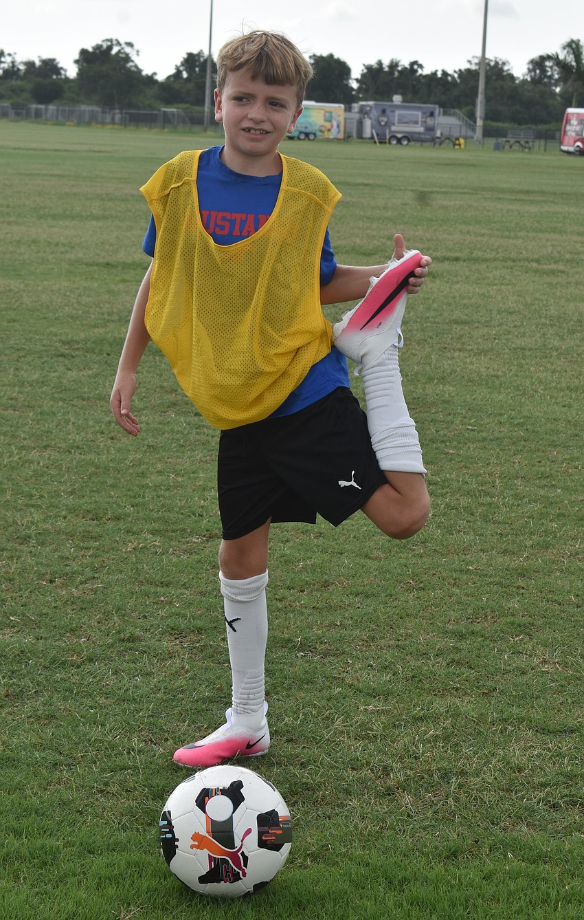 Lakewood Ranch 10-year-old Cooper Lux says stretching makes his body less sore, which allows him to hustle more on the field.