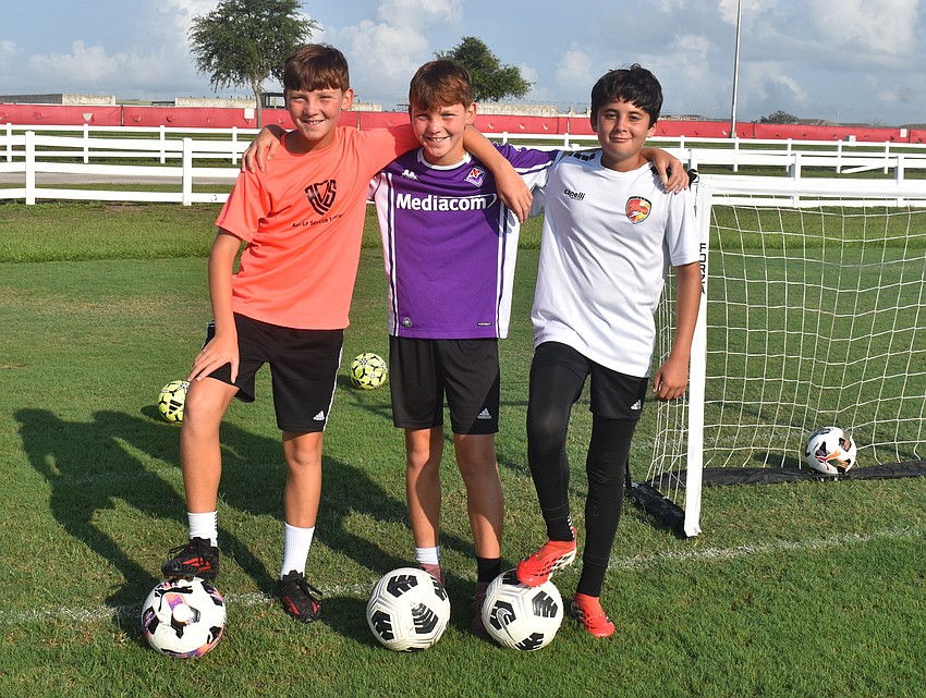 Ricky Caiazzo, Nicky Caiazzo and Myles Vernovski, all Lakewood Ranch 13-year-olds, prepare to learn from the pros at the Sarasota Paradise Youth Soccer Camp.