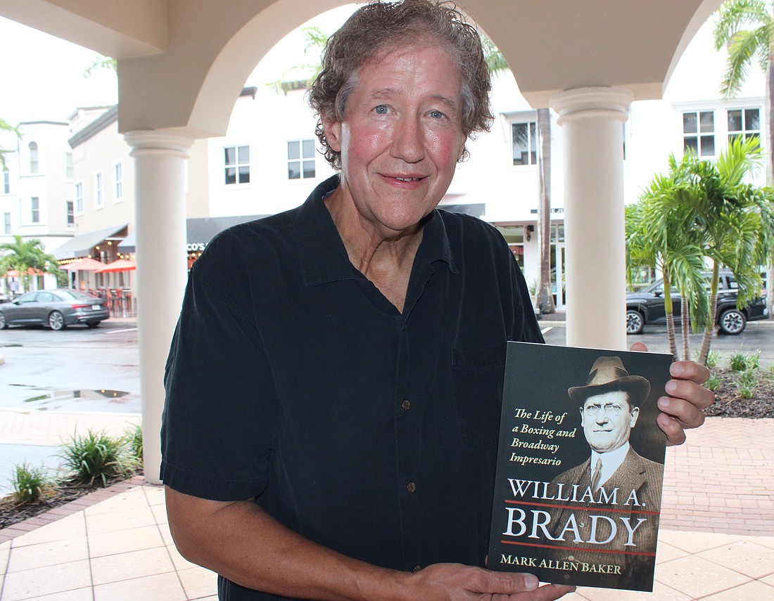 Country Club East's Mark Allen Baker shows off his newest book, "Willian A. Brady — The Life of a Boxing and Broadway Impresario."