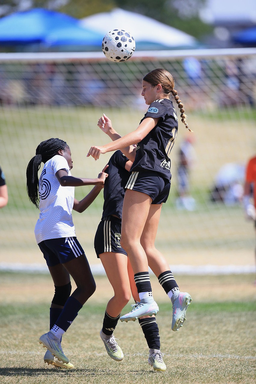 Lauren Bittar (right) goes for a header during a match. Her mother, team manager Kim Bittar, said Florida Premier FC SWFL held five fundraisers at Publix stores for its trip to the U.S. Club Soccer National Cup. Lauren Bittar (right) goes for a header during a match. Her mother, team manager Kim Bittar, said Florida Premier FC SWFL held five fundraisers at Publix stores for its trip to the U.S. Club Soccer National Cup.