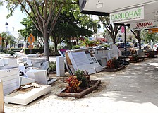 Storm debris piled up along streets across the city and St. Armands Circle for weeks following the 2024 hurricanes.