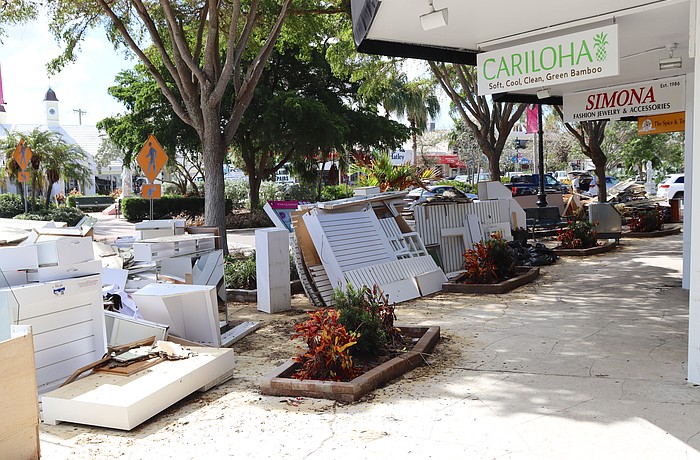 Storm debris piled up along streets across the city and St. Armands Circle for weeks following the 2024 hurricanes.