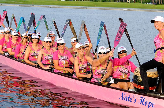 Survivors In Sync is a dragon boat team made up of breast cancer survivors.