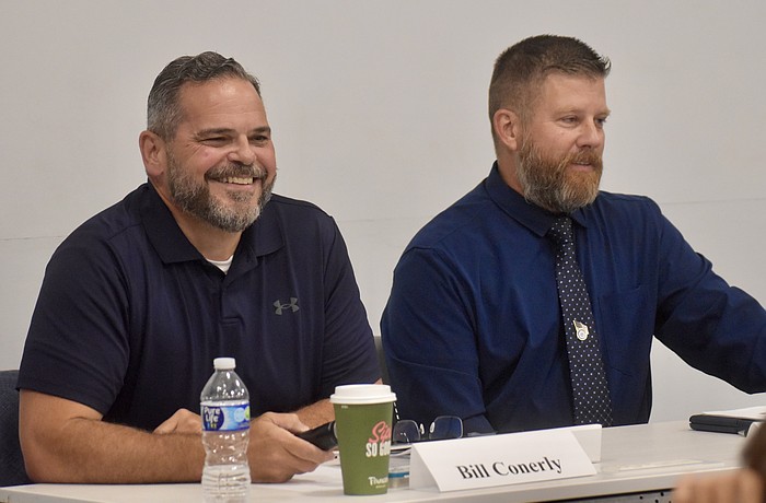District 72 Rep. Bill Conerly and his challenger, John Phillips, attend a candidate forum at the Lakewood Ranch Library Aug. 1.