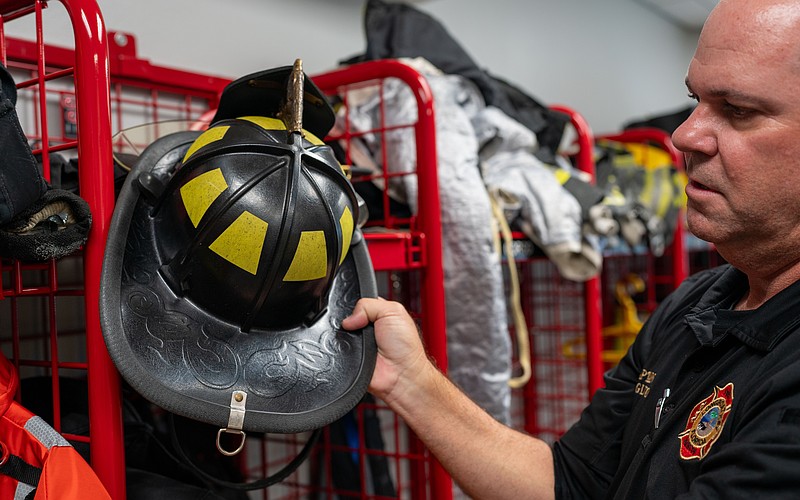 Longboat Key Fire Rescue Training Capt. David Eggleston said firefighter helmets have bills on the rear of the helmet so contaminated water can roll off without soaking into the jacket and pants firefighters wear while battling blazes.