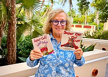Longboat Key author Wilma Davidson, president of the local Pen Women chapter, is celebrating the publication of 'Super Cat Chit Chat,' the follow-up story to the 'Super Cat! Splat! Splat!' children's book.