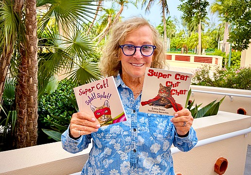 Longboat Key author Wilma Davidson, president of the local Pen Women chapter, is celebrating the publication of 'Super Cat Chit Chat,' the follow-up story to the 'Super Cat! Splat! Splat!' children's book.
