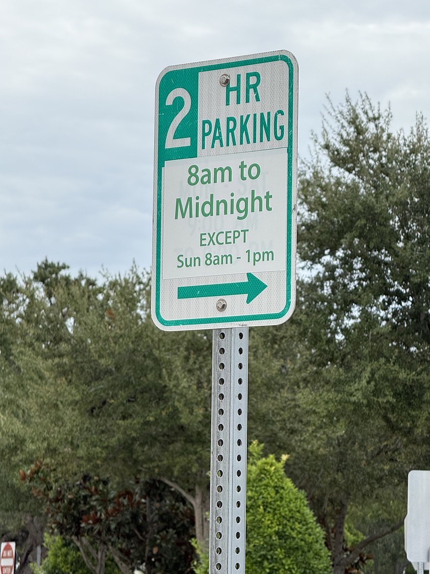 Some 800 signs throughout downtown were changed to reflect the now-suspended new parking regulations. Some 800 signs throughout downtown were changed to reflect the now-suspended new parking regulations.