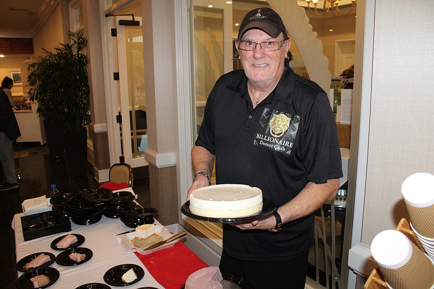 Gary Hagen dishes up some of his famous cheesecake at the 2026 Taste of the Keys.