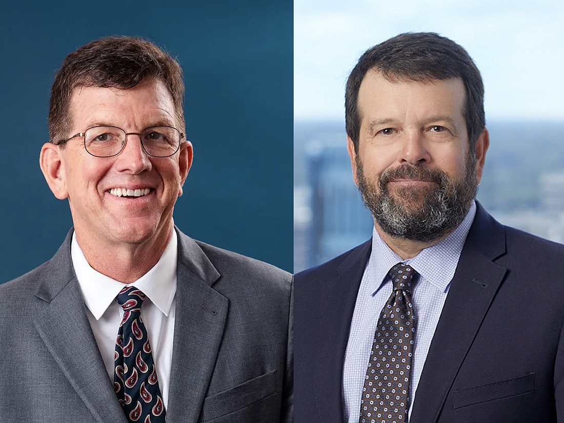 Jacksonville attorneys Bryan Gowdy, left, and M. Scott Thomas joined Funding Florida Legal Aid's board of directors.