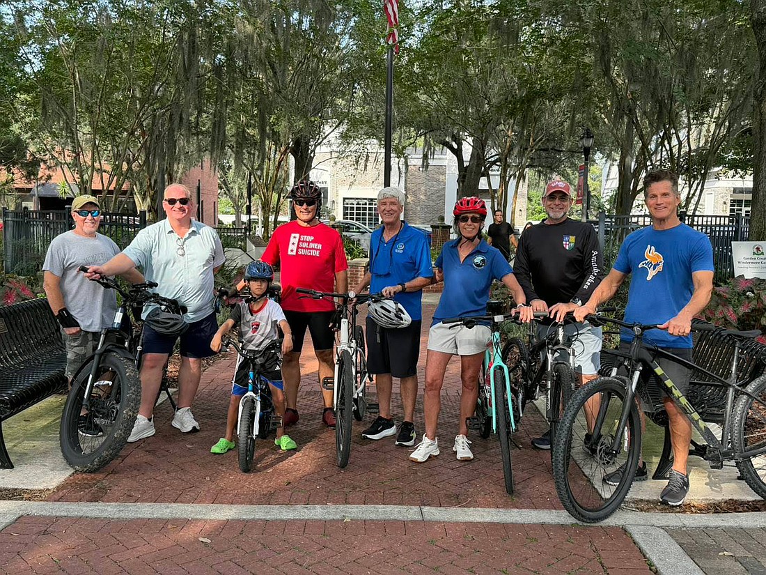 Windermere resident Bill Martini, former Mayor Jim O'Brien, Brady Smith, Windermere Town Council member Tony Davit, resident Rick Allen, Town Council member CT Allen, Mayor Andy Williams and Town Council member Tom Stroup all rode together to support Davit's mission of riding 250 miles for veteran suicide awareness.