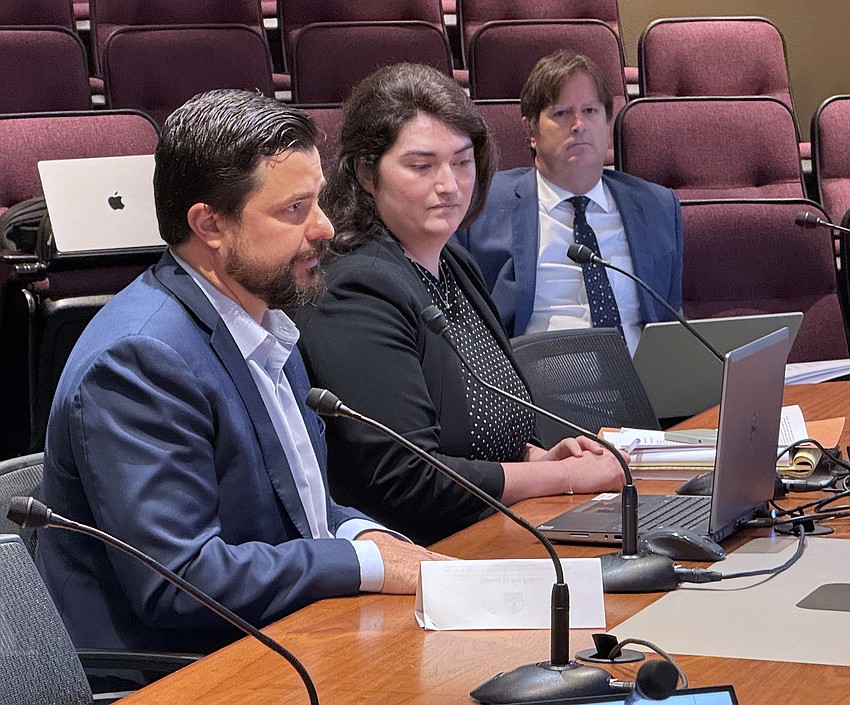 Attorneys Patrick Seidensticker and Macaire King present plans for 1776 Ringling Condominium as Deputy City Attorney John Shamsey looks on. Attorneys Patrick Seidensticker and Macaire King present plans for 1776 Ringling Condominium as Deputy City Attorney John Shamsey looks on.