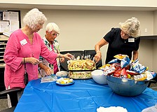 Sandra Johnson, Connie DiMaggio and Linda Theuer put finishing touches on the lunch they and fellow Longboat Island Chapel volunteers provided to Longboat Island Police officers on Thursday. It is Longboat Key Fire Rescue's turn on Wednesday.