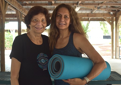 Country Club's Lilly Chaddha and her daughter, Simi Ranajee, find Shanti Yoga to be a place of peace, relaxation and growth.