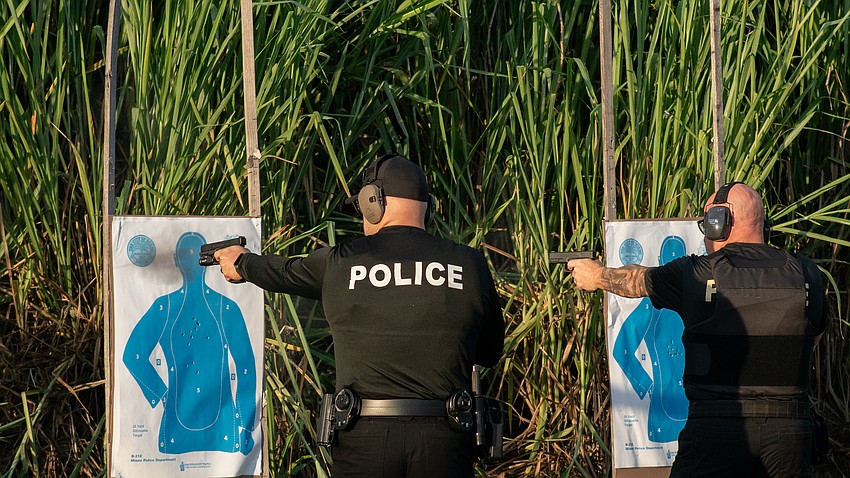 Glock 45 service weapons are fired at targets by Longboat Key police officers Thursday, Aug. 6.