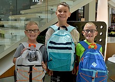 East County's Preston, Ashton and Clayton Nicholson are all eager to start their school year at Gene Witt Elementary School after attending the Back to School Bash at The Mall at University Town Center.