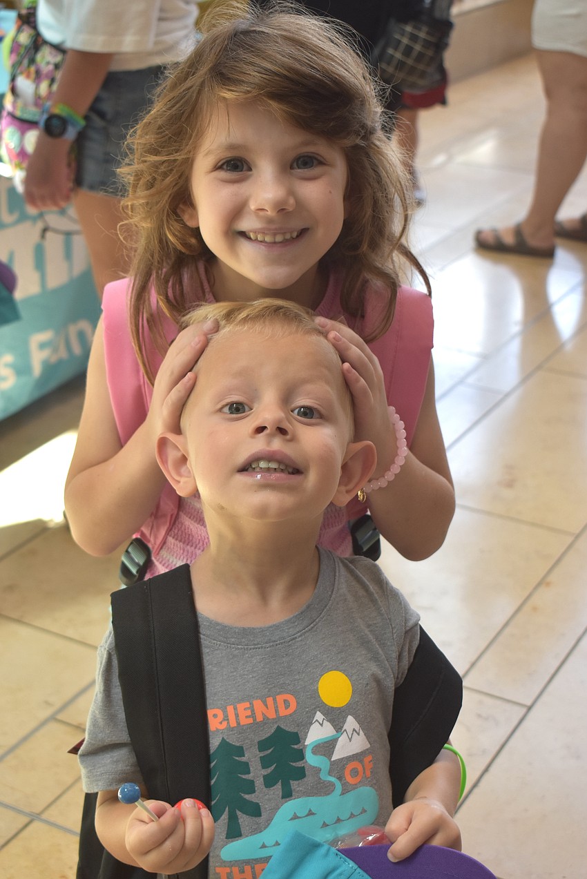Lakewood Ranch's Rosemary Smith, 6, and Theodore Smith, 5, are happy to explore The Mall at University Town Center during the Back to School Bash Aug. 8.