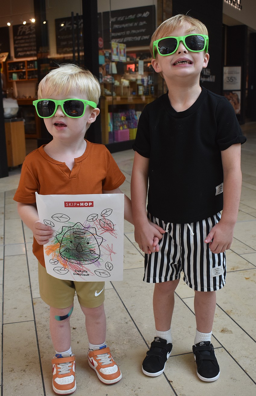 Palmetto 3-year-old Emmett Sprague and 4-year-old Easton Sprague feel too cool for school in their new sunglasses from The Coder School.