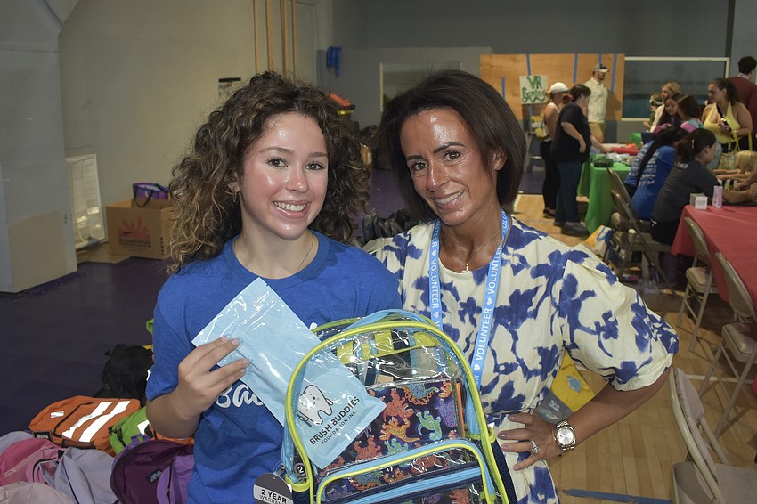 Gianna Demino, a senior at Riverview High School, established Brush Buddies Foundation to provide basic dental care to underserved children in Sarasota and Manatee counties. She included a Brush Buddies Smile Starter Kit in around 500 of the backpacks given out at Badges and Backpacks, while the nonprofit has given out over 7,000 kits since its founding. She is pictured here with her mother, Valerie Demino.