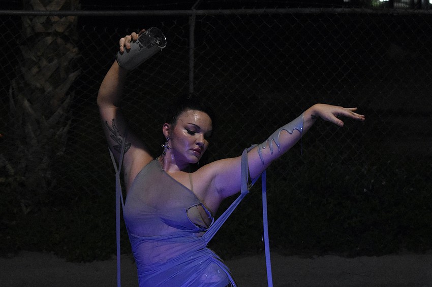 St. Pete aerialist, fire performer and artist Mala Vavourakis prepares her canvas.
