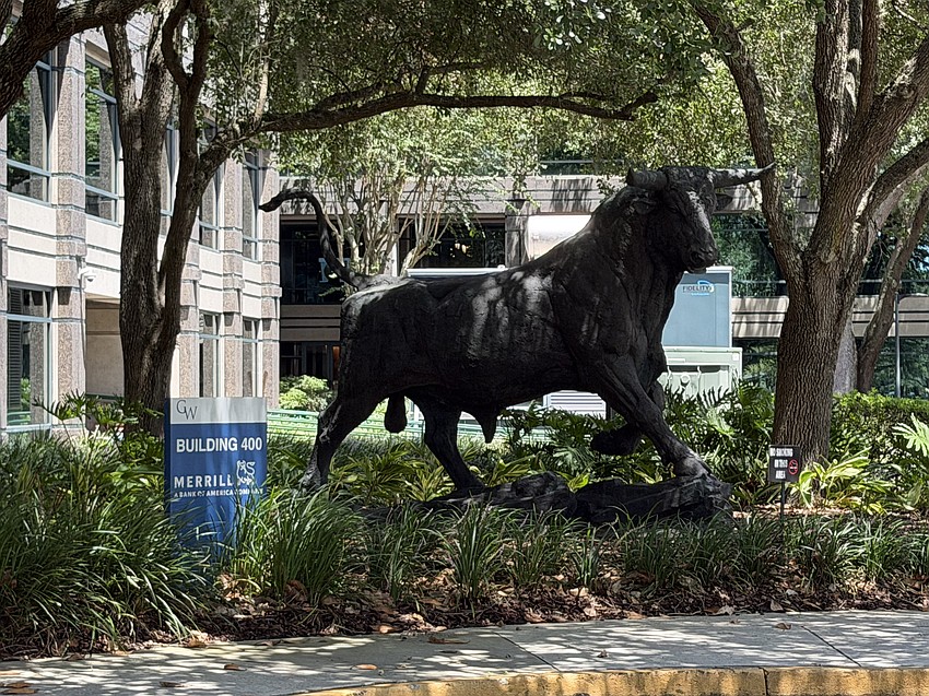 Bank of America relocated the bull statue from the previous Merrill Lynch campus to the bank’s Building 400 for “Merrill A Bank of America Company.” The bull in Merrill Lynch’s logo is said to symbolize optimism, strength and prosperity. Bank of America relocated the bull statue from the previous Merrill Lynch campus to the bank’s Building 400 for “Merrill A Bank of America Company.” The bull in Merrill Lynch’s logo is said to symbolize optimism, strength and prosperity.