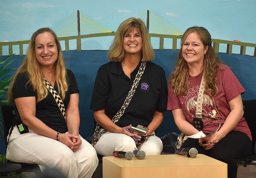Assistant Principal Jennifer McManis, Principal Sheila Waid and Media Specialist Kelly Kolomiychenko go over first day procedures and do 