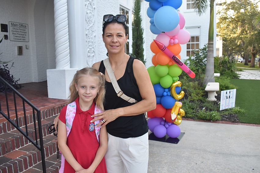 Third grader Emma Prochazka said her summer, which started on a different schedule from Sarasota's while her family was in the Czech Republic, was too short, as she arrived at Southside Elementary with her mother Petra Prochazka.