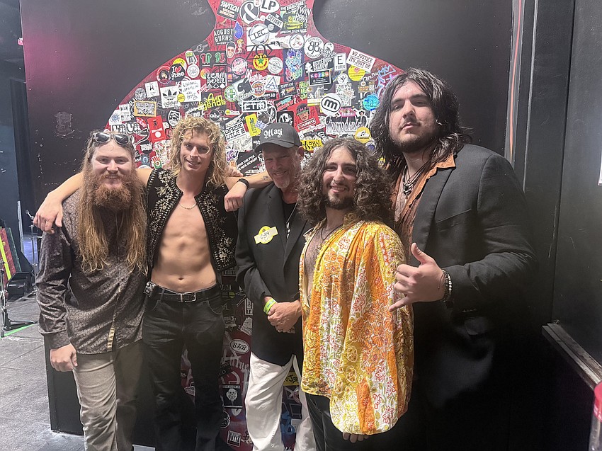 Jeff Hanson, center, works with Magi, an independent rock and roll band. Jeff Hanson, center, works with Magi, an independent rock and roll band.