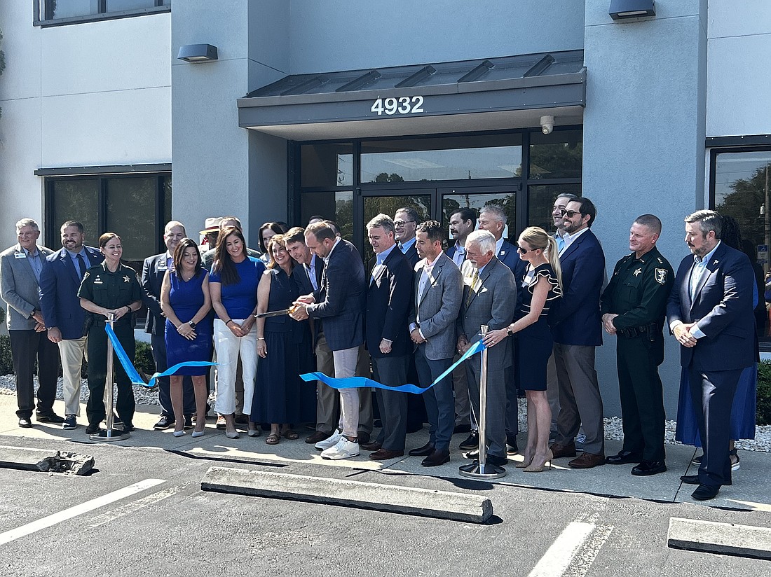 Officials and Northeast Florida Builders Association representatives cut the ribbon Aug. 13 at the association’s new workforce education center and headquarters on Sunbeam Road.