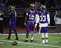 Former Booker football players Kevontay Hugan (10) and Le'Darien Smith (33) are pictured during a game in 2025. The Tornadoes will not compete in any varsity football games this fall.