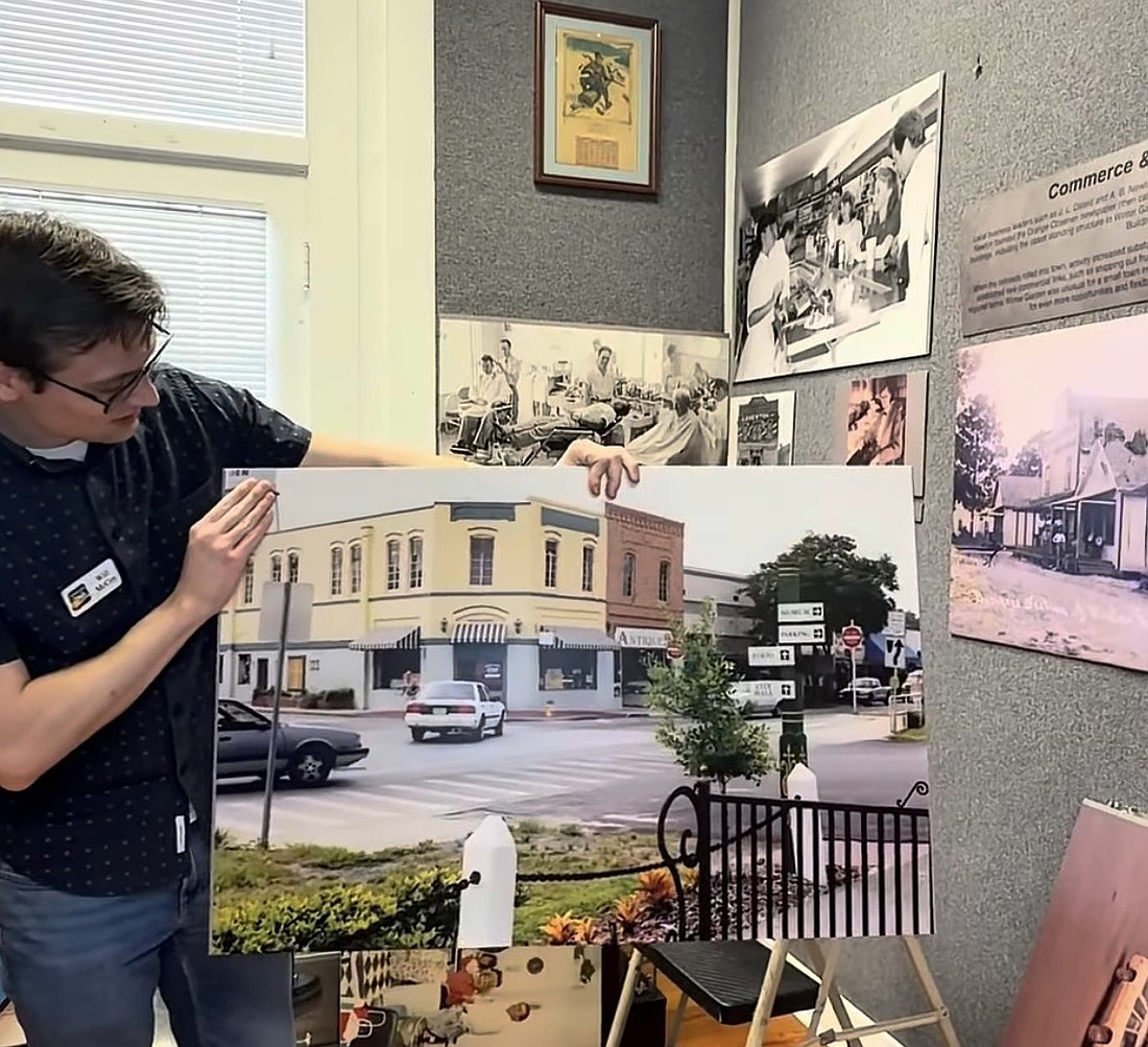 Winter Garden Heritage Museum Director Will McCoy showed a sneak peek of artifacts and photographs at the exhibit.