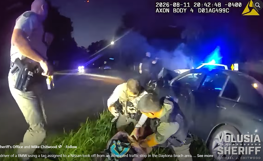Officers arrest a 39-year-old Holly Hill man following a car chase Tuesday night, Aug. 11. Screenshot from Volusia County Sheriff’s Office social media.