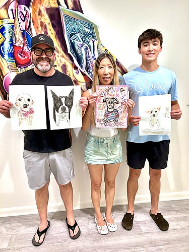 The McBrooms: Dennis, Nhi and their son Ethan. Courtesy photo