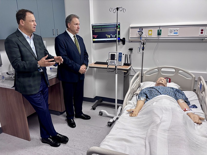 Tampa General president and CEO John Couris (left) talks with USF President Moez Limayem (right) in a simulation lab inside the newly expanded College of Nursing. Tampa General president and CEO John Couris (left) talks with USF President Moez Limayem (right) in a simulation lab inside the newly expanded College of Nursing.